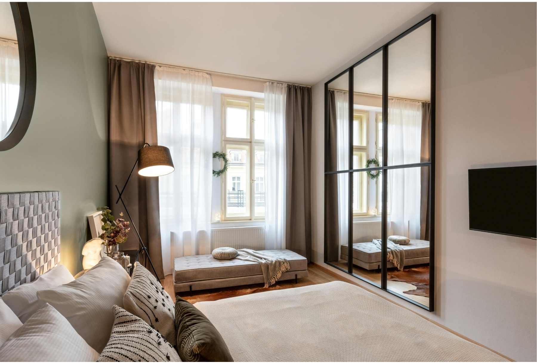 Elegantly staged bedroom in a Kelowna Airbnb rental managed by Simply Hosted